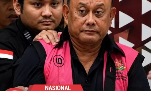 Dadan Hindayana Kenakan Rompi Pink Kejagung